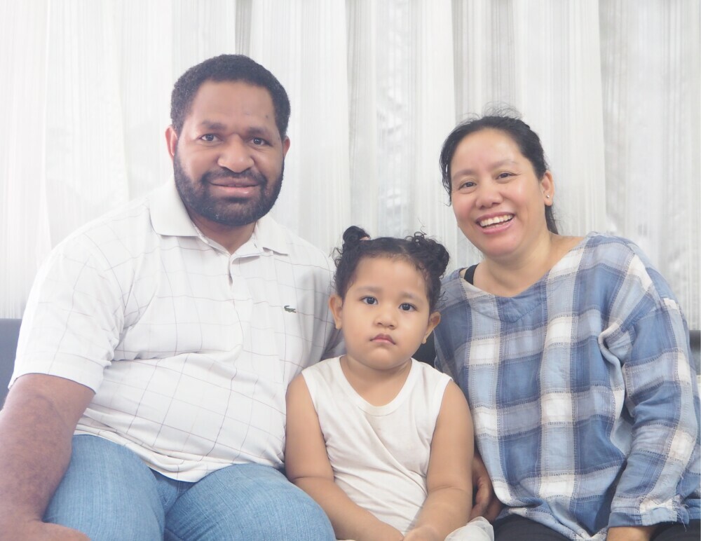 Image of a missionary family from Papua New Guinea, namely Paul Mondo, Nimbine Lemshong Mondo and Ngamchu Phom Mondo. THey are a full time missionary family currently serving in Thailand with the Bible League Thailand, India and Papua New Guinea under PNG soul harvest mission.