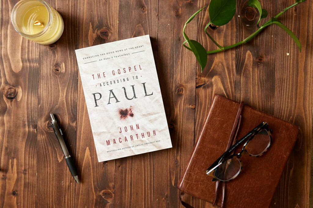 Illustration of an open Bible with the words “Redemption: Genesis to Revelation” highlighted